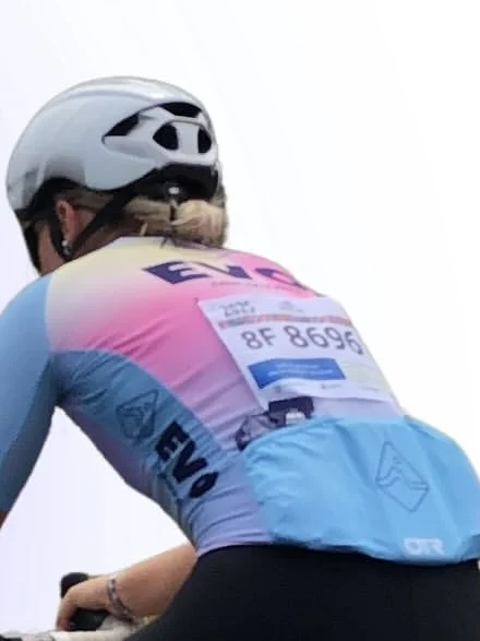 Christie racing in EVO kit, seen from behind